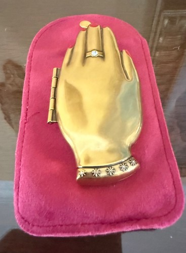 Hand shaped golden sided - hand,
